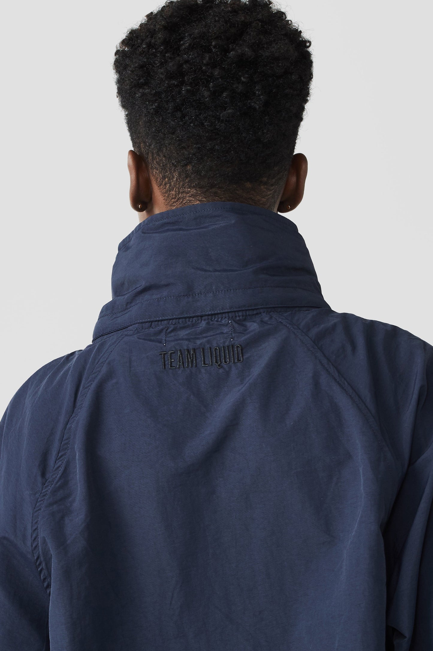 CREST RECYCLED NYLON WINDBREAKER