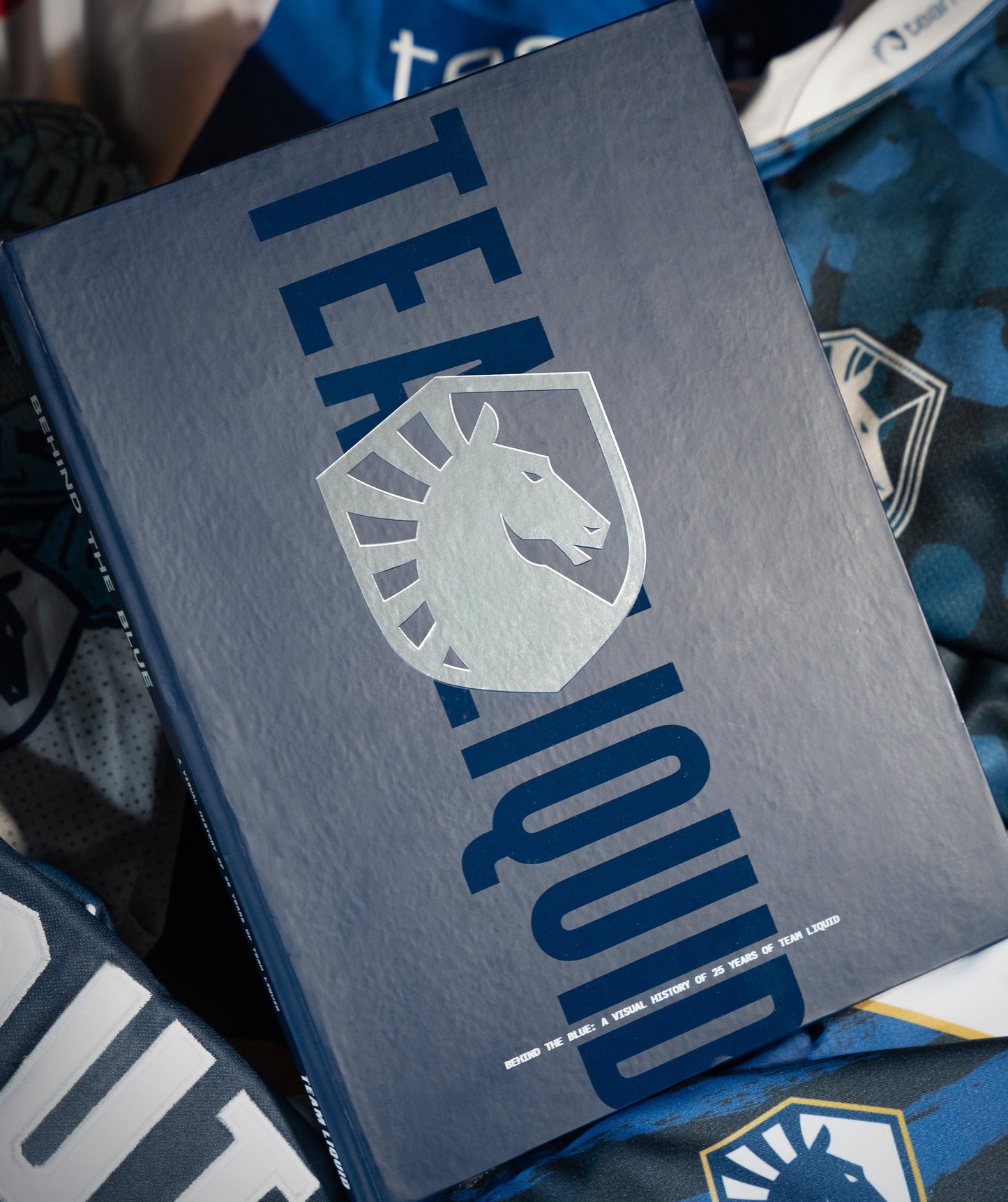 BEHIND THE BLUE: A VISUAL HISTORY OF 25 YEARS OF TEAM LIQUID