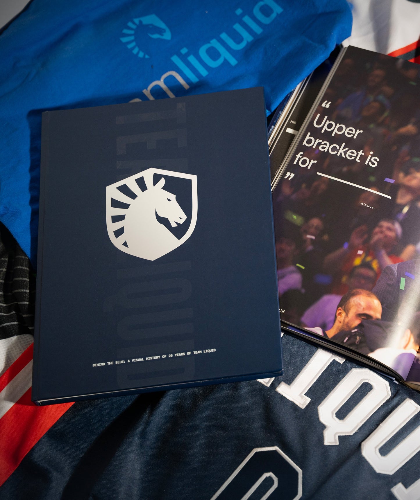 BEHIND THE BLUE: A VISUAL HISTORY OF 25 YEARS OF TEAM LIQUID