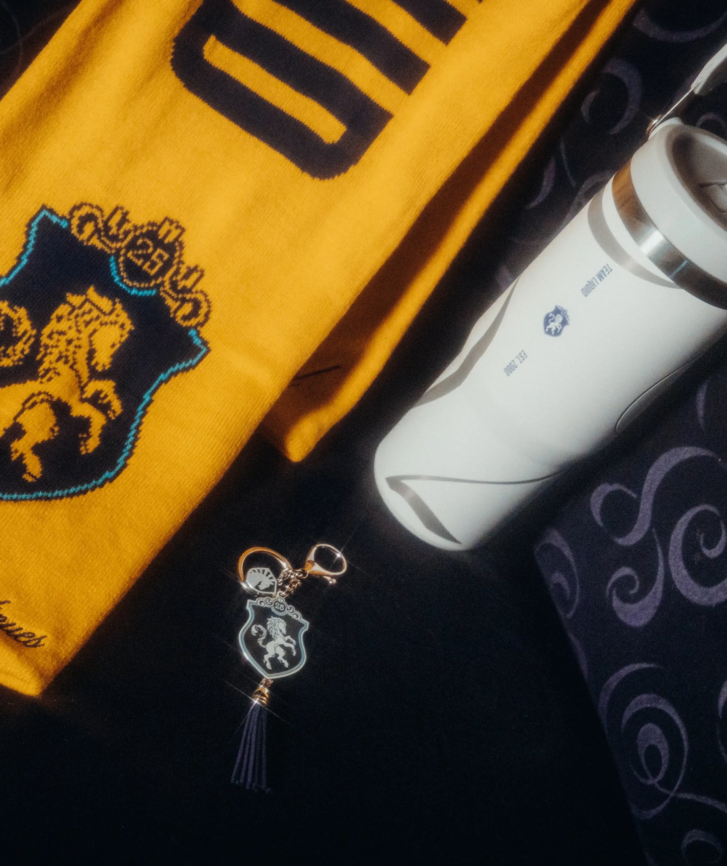 QUARTER CENTURY KEYCHAIN